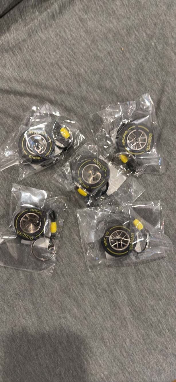 Invicta Racing F1 Rubber Medium Tire Yellow Striped Keychain IG0346